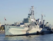 HMS Belfast on River Thames in London. Photo Credit: © Alvesgaspar via Wikimedia Commons.